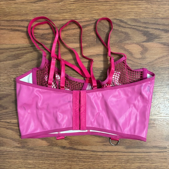 pink PVC leather bra top with a cross motif - Picture 2 of 2